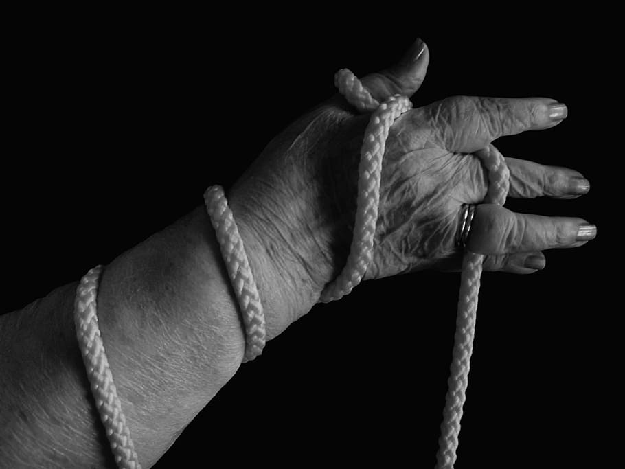 grayscale photo, woman, holding, rope, hand, caught, bound, old, age, fear
