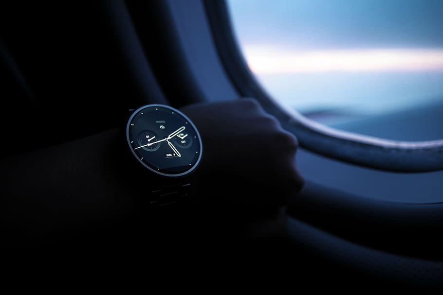person, wears, black, grey, smartwatch, riding, airplane, wristwatch, technology, time