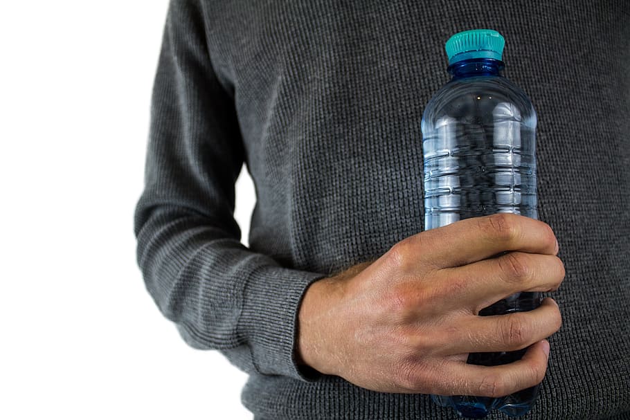 person, holding, clear, plastic bottle, water bottle, water, mineral water, pet, bpa, plastic bottles