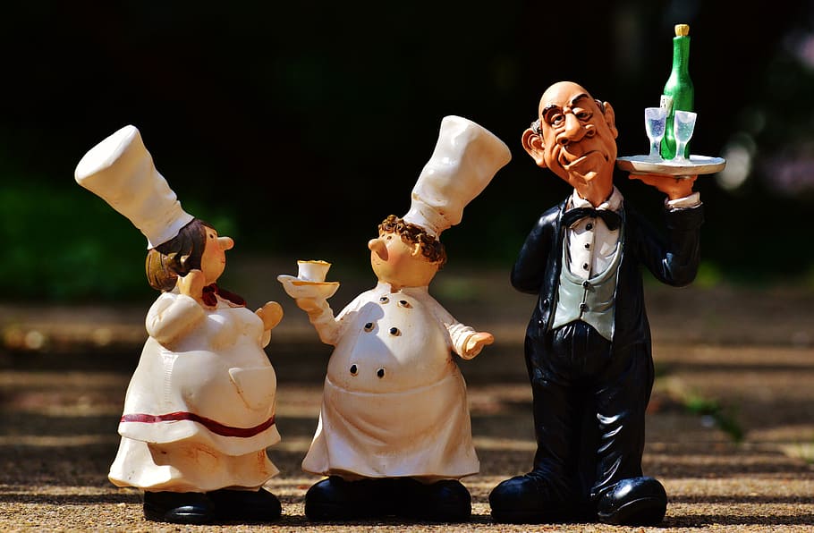 chef, waiter figurine, wooden, surface, butler, tray, beverages, wine, champagne, operation