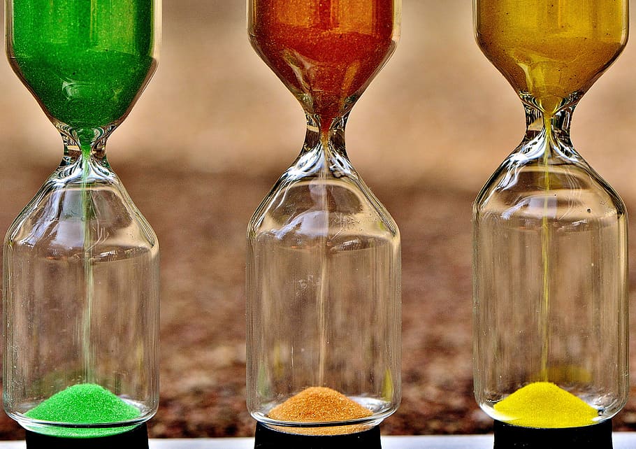hour glasses with colored sand