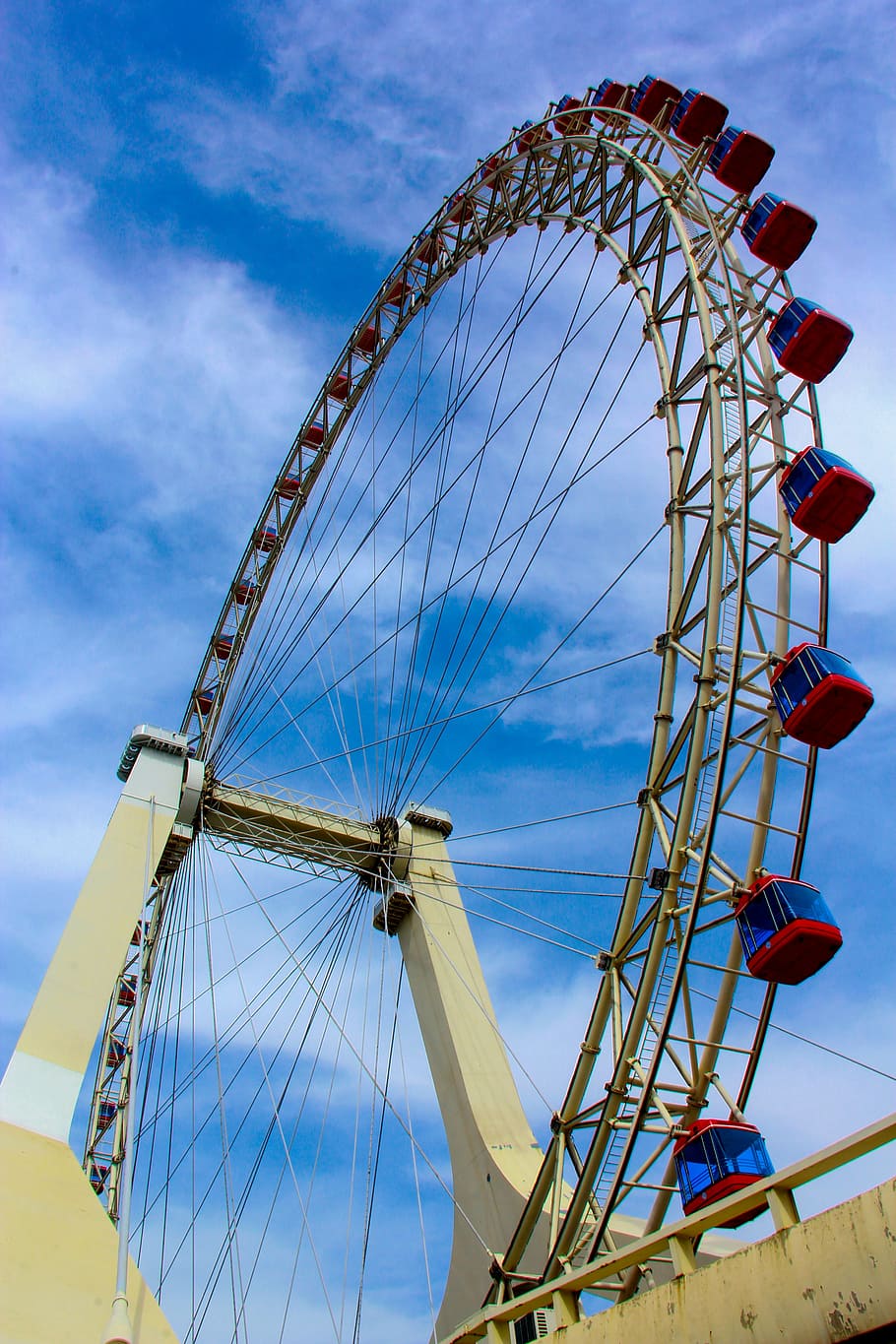 the ferris wheel, sky, tianjin eye, amusement park ride, amusement park, ferris wheel, arts culture and entertainment, cloud - sky, low angle view, nature
