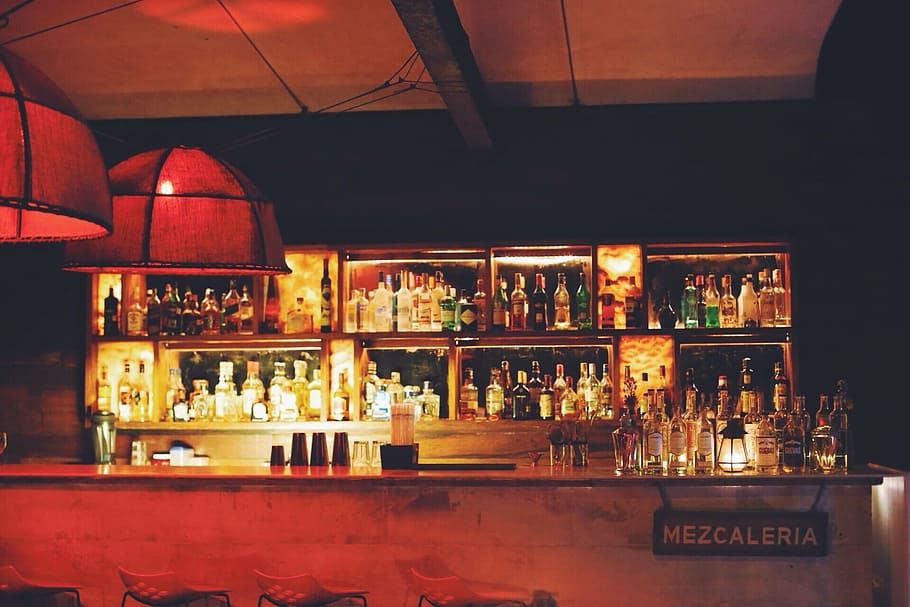 lighted, mezcaleria bar desk, assorted, bottles, bottle, rack, bar, drinks, alcohol, liquor