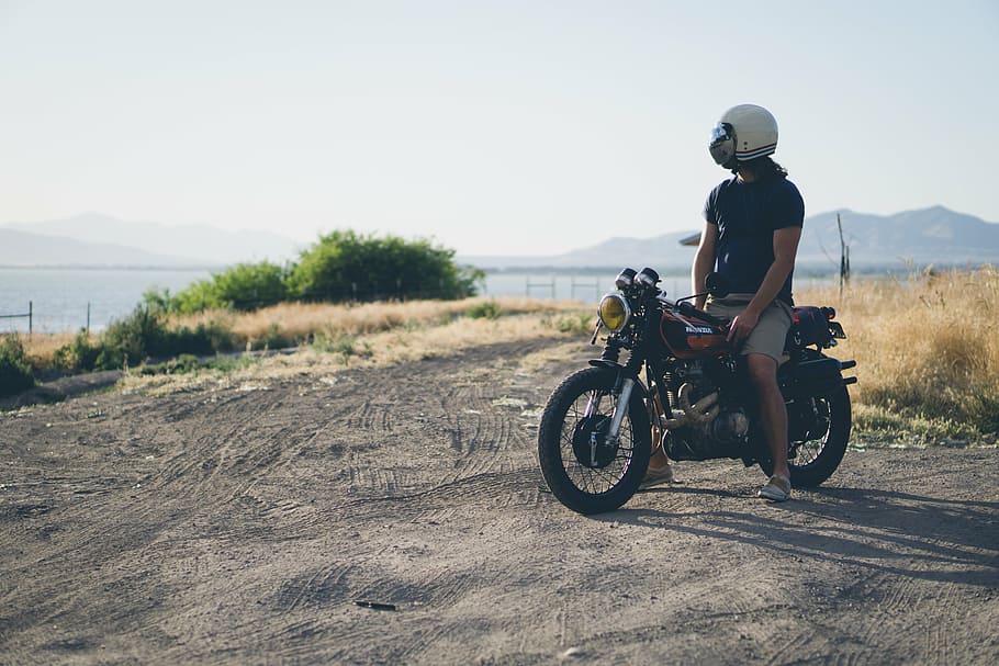 man, riding, motorcycle, lake, dirt road, ocean, person, sea, sky, crash helmet