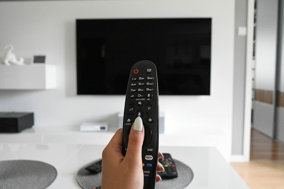 tv, television and radio, screen, pictures, pilot, living room, monitor, media, remote control, human hand