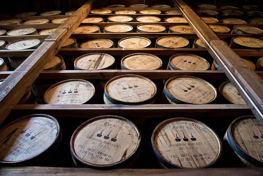 distillery barrels, wooden kegs, bourbon, whiskey, aging, liquor, drink, adult beverage, wood - material, large group of objects