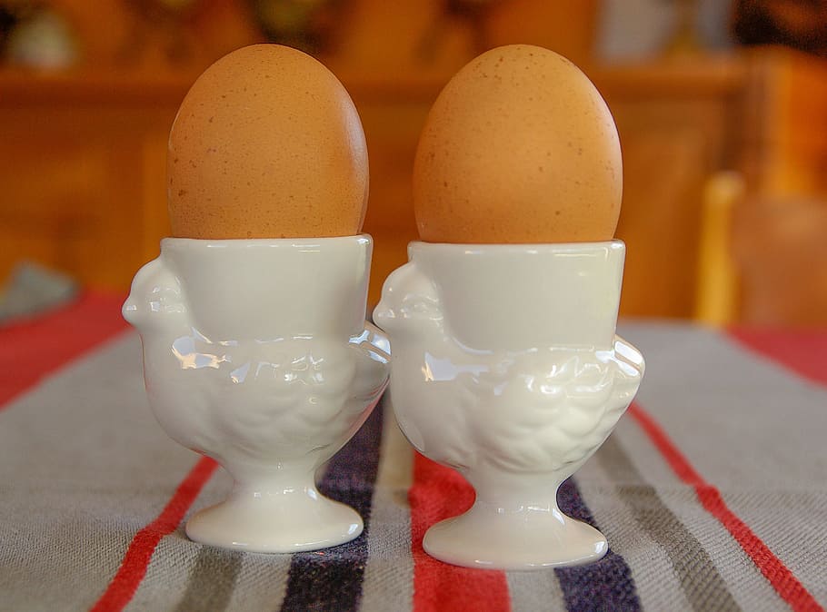 boiled eggs, eggs, egg cups, hen, food and drink, egg, eggcup, close-up, indoors, focus on foreground