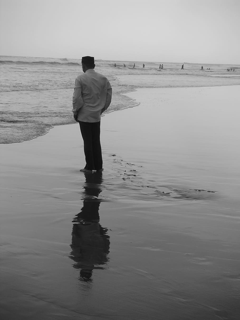 human-beach-mirroring-by-the-sea.jpg