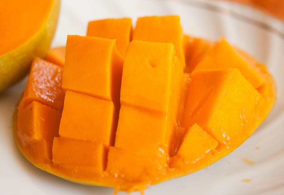 sliced, mango fruit, white, surface, mango, fruit, exotic, orange, ripe, food