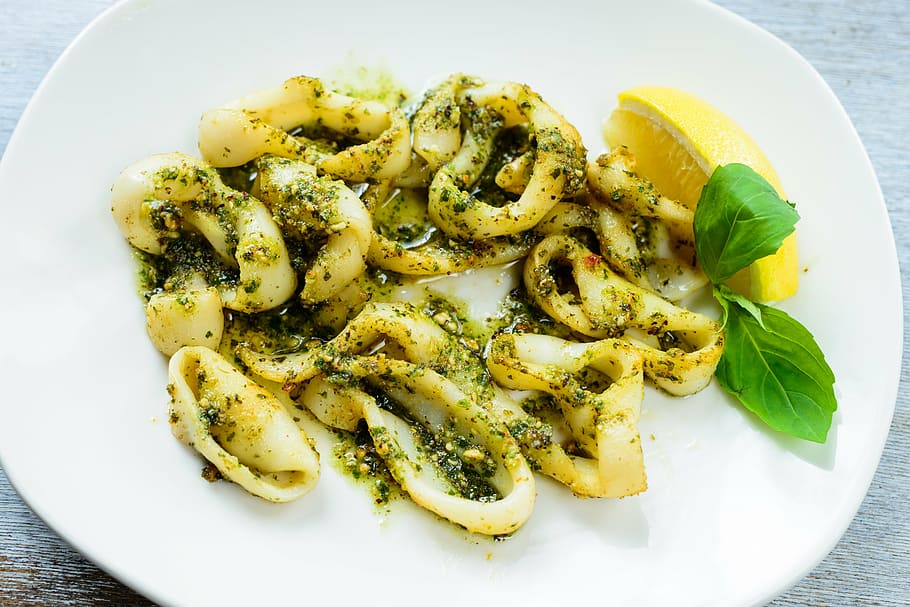 plate of calamares, squid, antipasti, lemon, seafood, meal, food, dish, calamari, gourmet