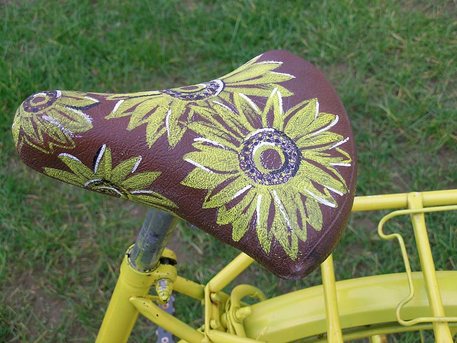 Saddle, Bicycle, Flowers, Decoration, yellow, wheel, grass, green color, one animal, close-up