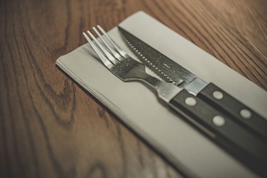 fork, knife, utensils, napkin, table, food, wood - material, close-up, selective focus, indoors