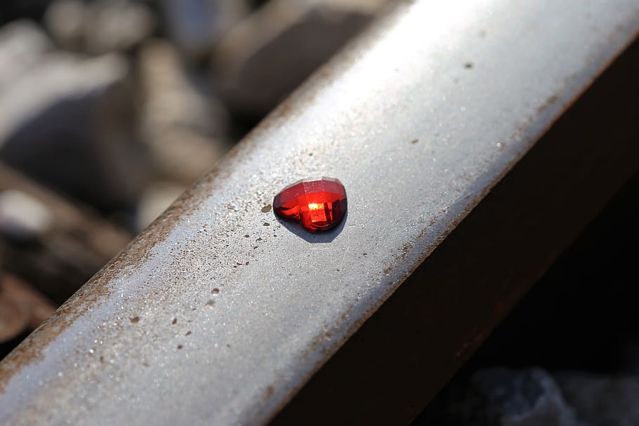 glowing red heart on railway, stop children suicide, stop teenager suicide, for all kids and teens, who left us to soon, school stress, exam stress, academic stress, horror education system, ruthless education system