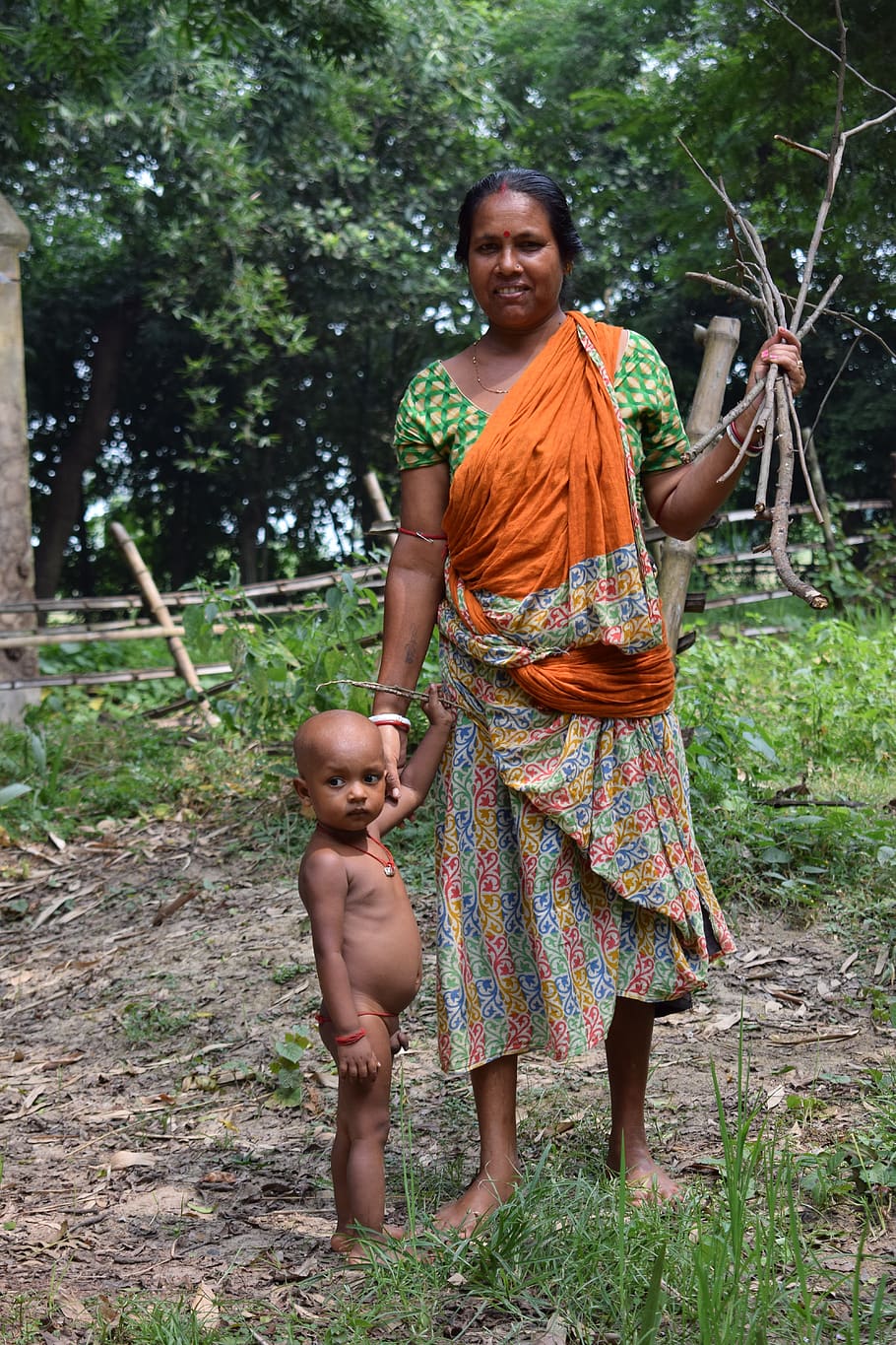 mother, child, bonding, west bengal, indian, poor, india, looking at camera, childhood, full length
