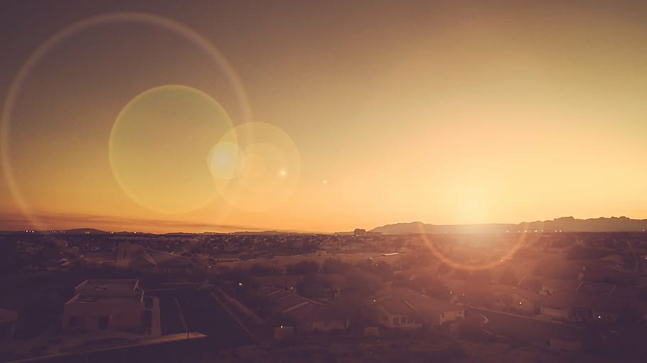 aerial, photography, buildings, daytime, lens, effect, flare, sunset, city, urban