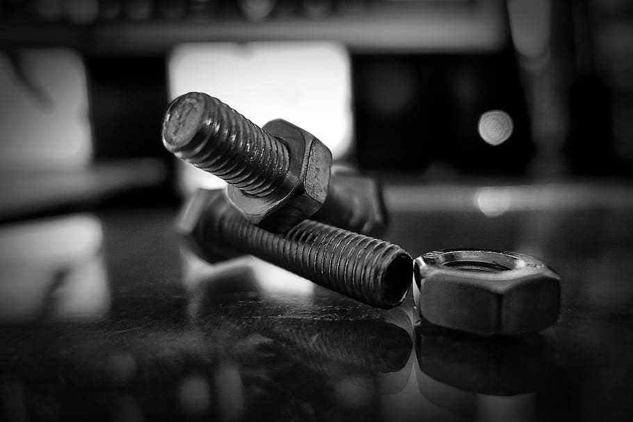 La, greyscale, photography, metal, nuts, bolts, close-up, focus on foreground, indoors, selective focus