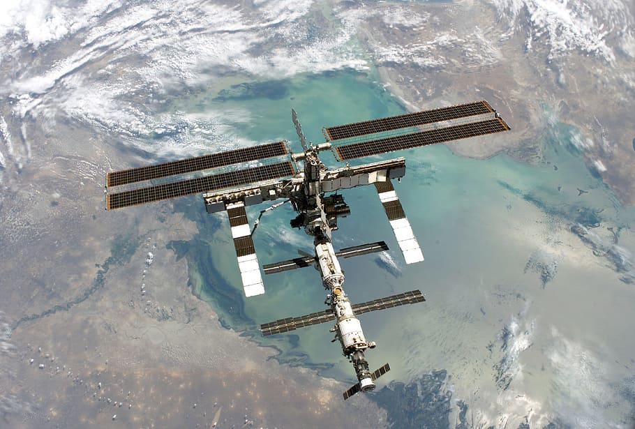 satellite outside earth, space station, international space station, space, nasa, space travel, solar cells, solar modules, science fiction, spaceship