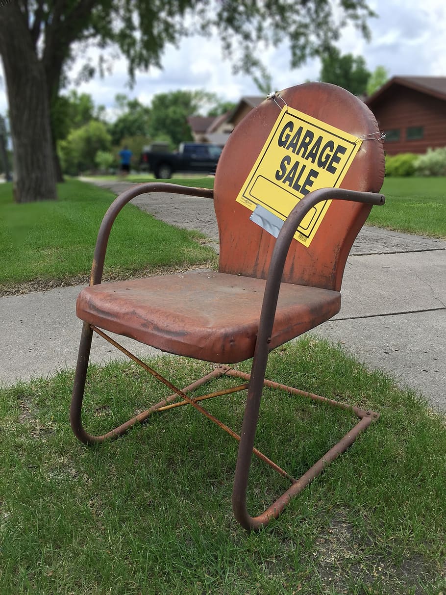 brown, steel armchair, daytime, garage sale sign, rusty, rusty metal chair, vintage, old lawn chair, metal lawn chair, rusted