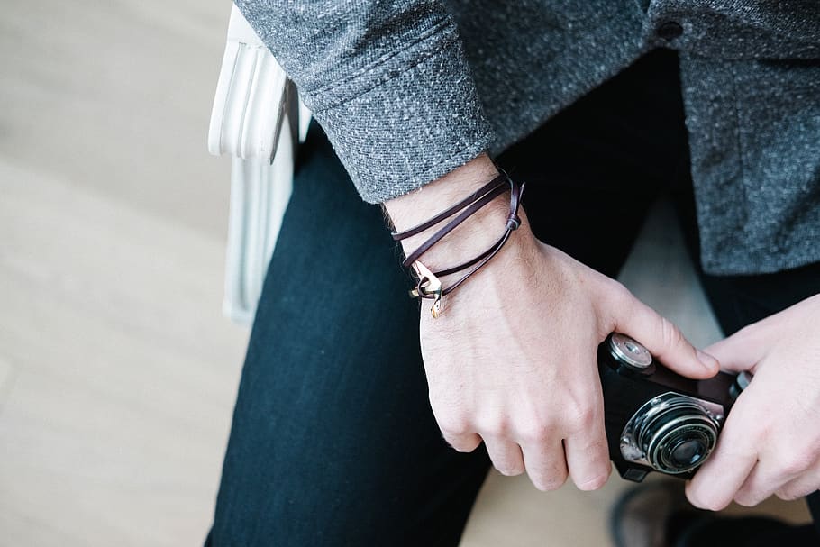 hands, camera, close up, bracelet, grapher, holding, person, equipment, casual, fashion