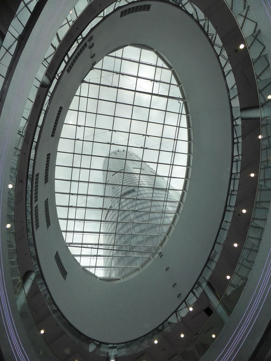 poland, wroclaw, sky tower, skyscraper, indoors, architecture, low angle view, built structure, geometric shape, glass - material