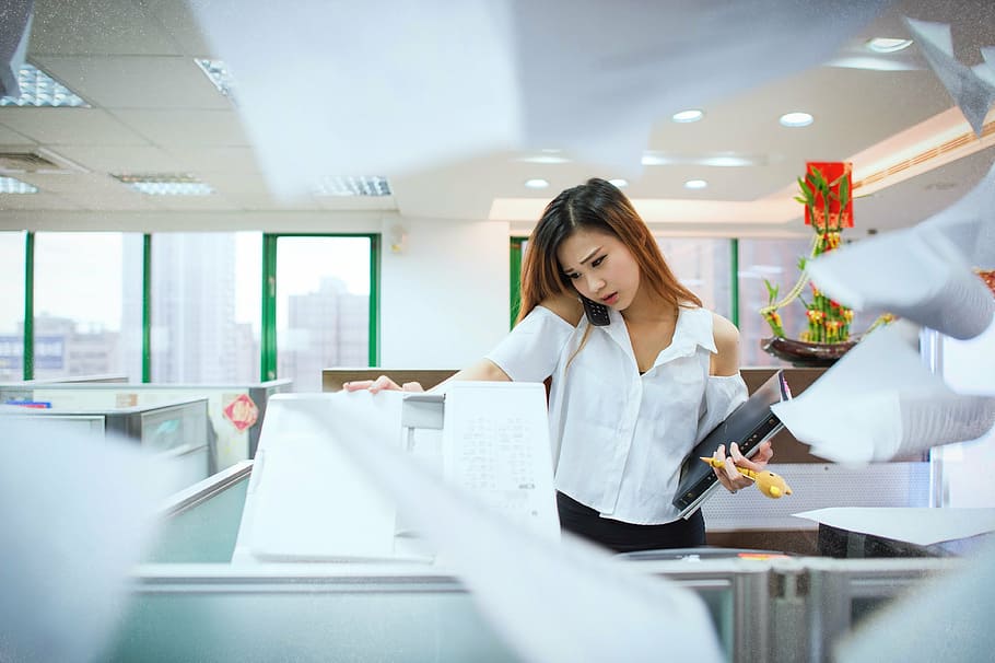 woman, wearing, white, cold-shoulder button-up shirt, holding, black,  component, photocopier machine, busy, office | Pxfuel