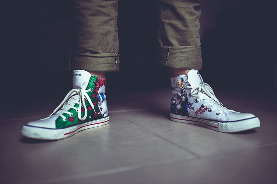 person, wearing, white, high-top sneakers, handmade, sneakers, shoes, colorful, painted, legs