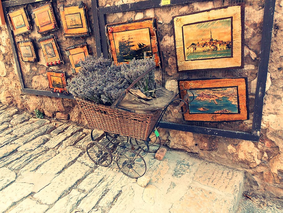 brown, wicker bassinet stroller, besides, photo frames, lavender, colors, pictures, old, abandoned, wall - building feature