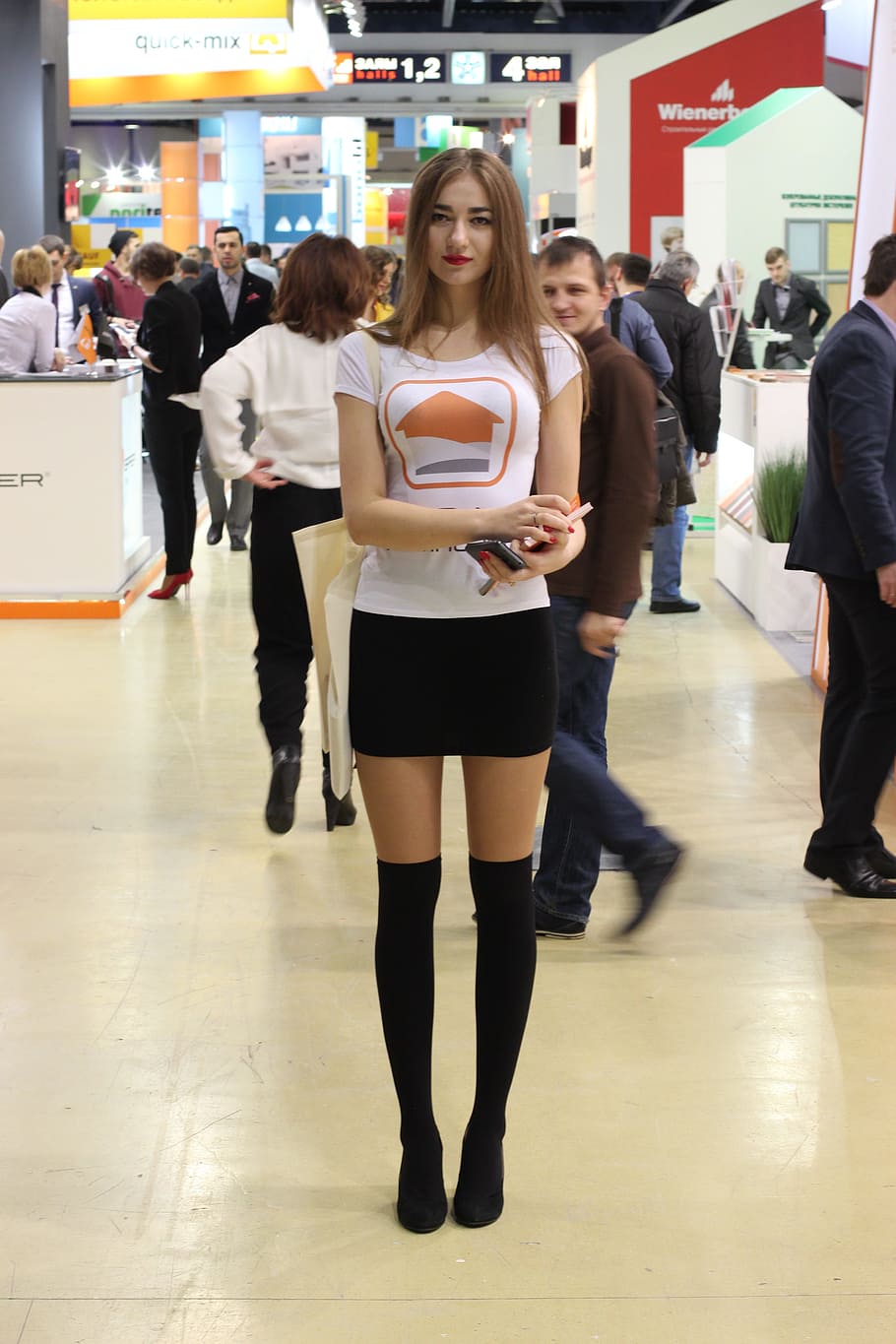 exhibition, girl, model, tall girl, distribution of leaflets, leaflet, directory, booklet, expocentre, moscow