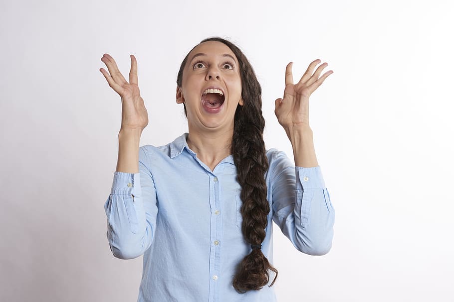 woman, blue, dress shirt, surprised, expression, excited, happy, fun, happiness, excitement