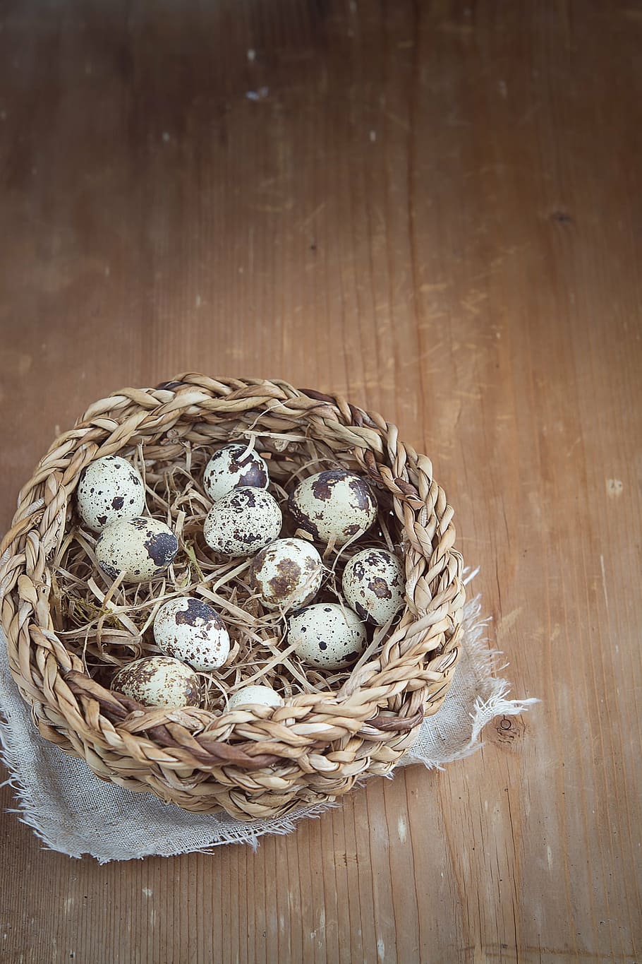 egg, quail eggs, basket, small eggs, natural product, easter, wood, close, text dom, negative space