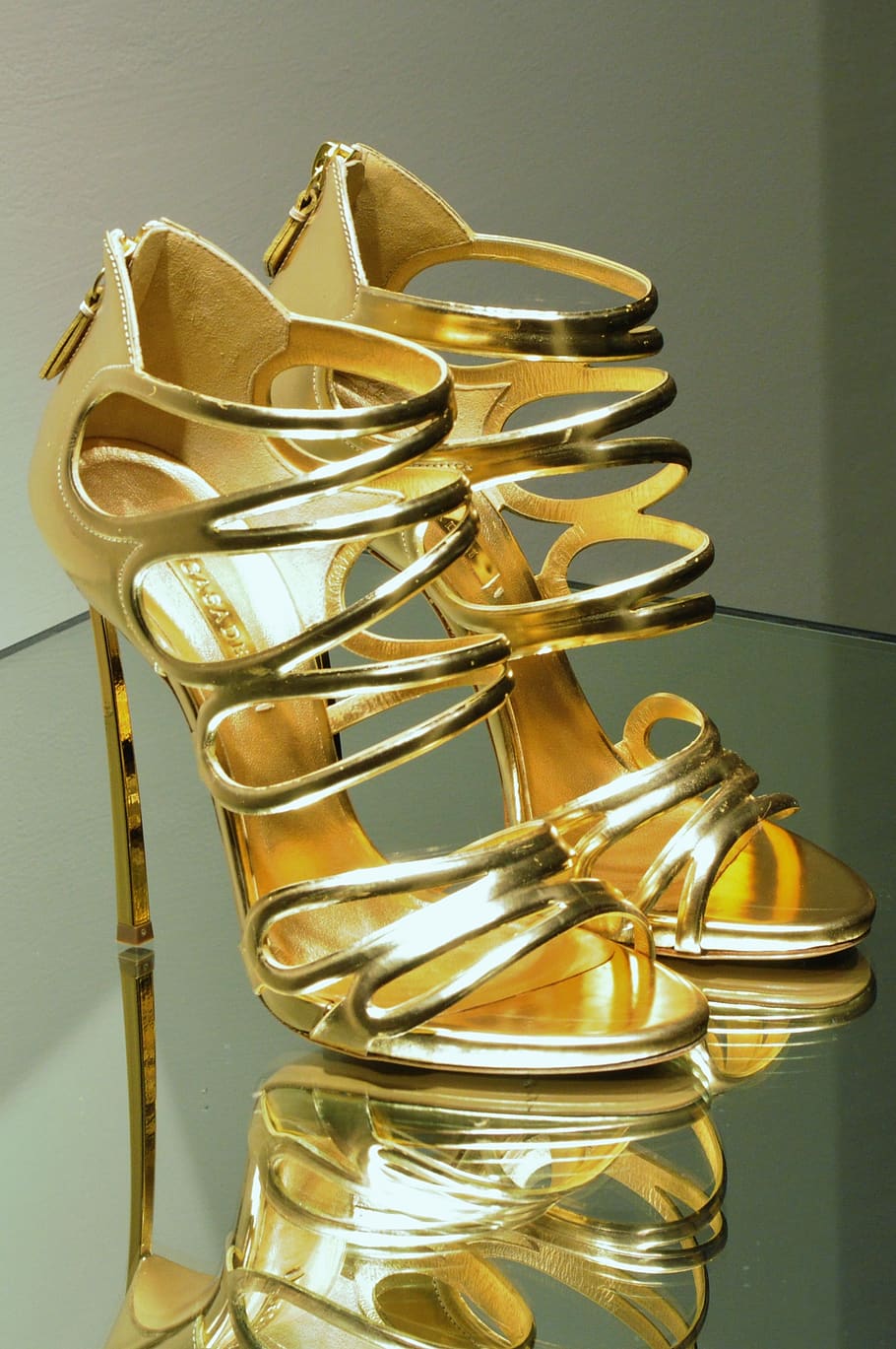 high heels, stilettos, shoes, gold, indoors, table, gold colored, metal, still life, close-up