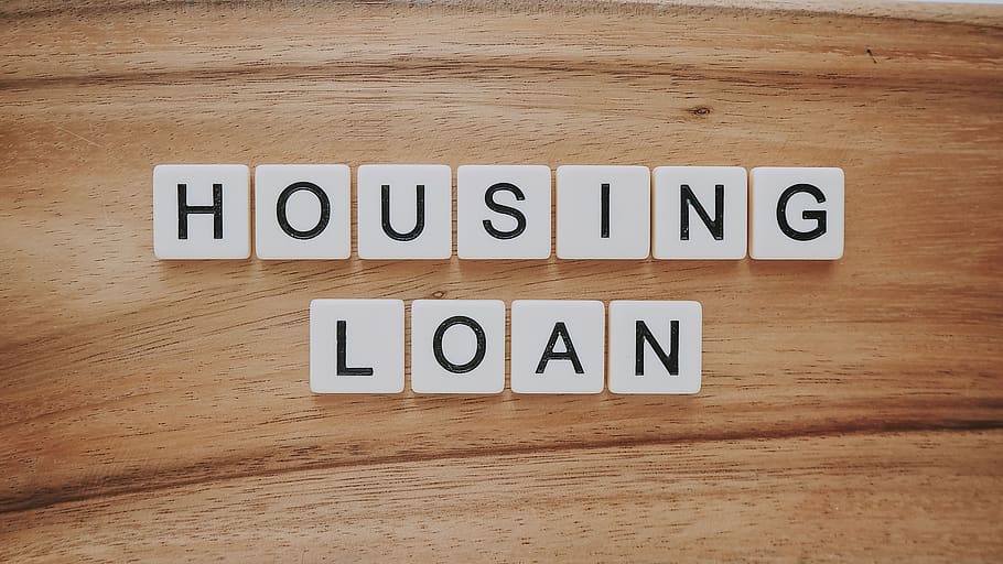 housing loan, loan, property, mortgage, finance, text, western script, communication, wood - material, indoors
