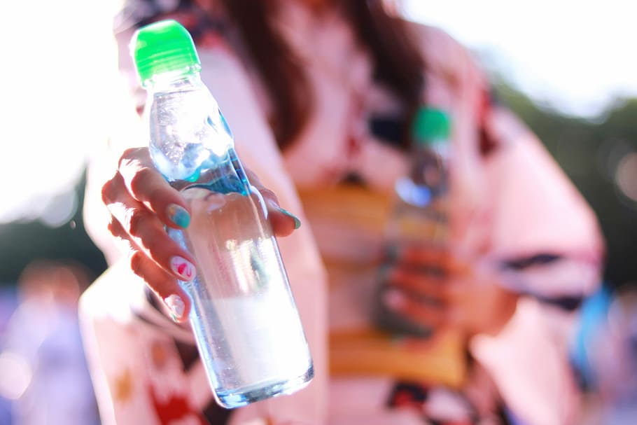 selective, focus photography, woman, holding, clear, glass water bottle, selective focus, photography, glass water, water bottle
