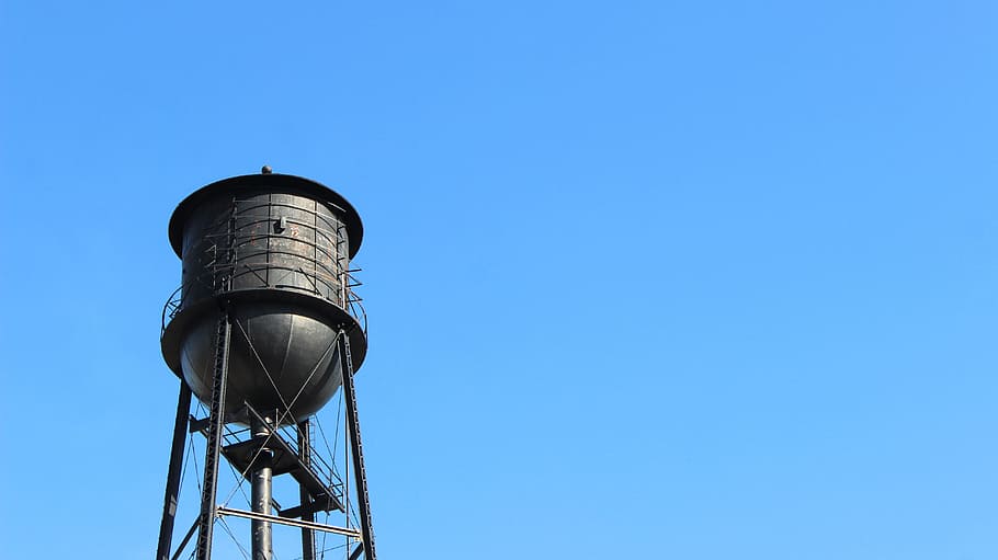 black, water tower, blue sky, community, rusty, sky, blue, low angle view, water tower - storage tank, architecture
