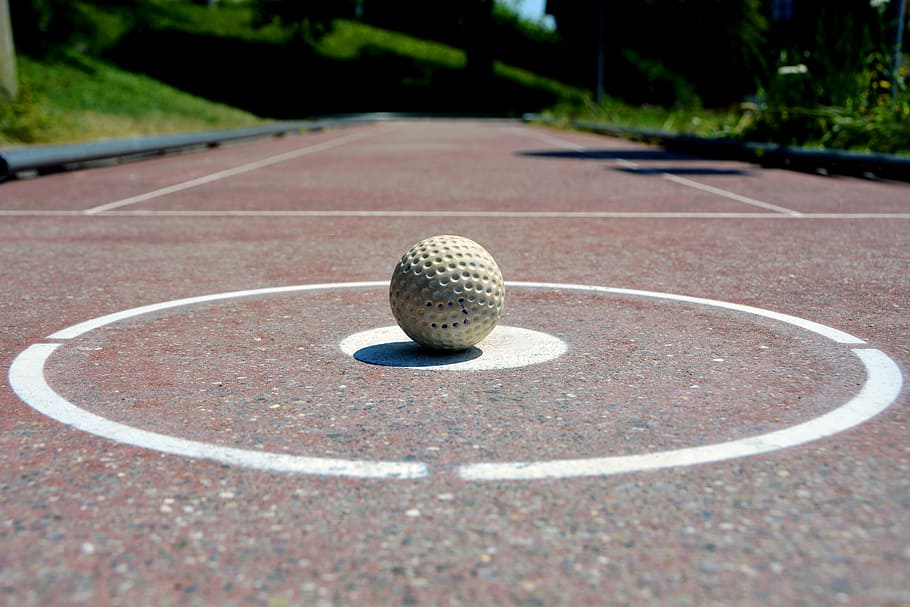 golf ball, brown, asphalt road, daytime, miniature golf, sport, leisure, play, field, mini
