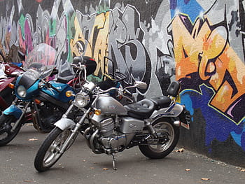 motor-bikes-graffiti-motorcycle-wheels-royalty-free-thumbnail.jpg