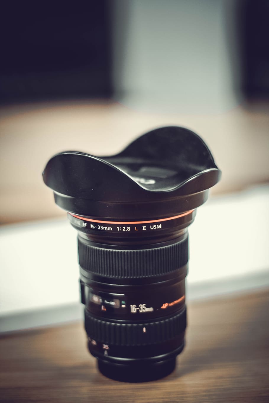 camera, lens, black, photography, blur, table, focus on foreground, technology, close-up, indoors