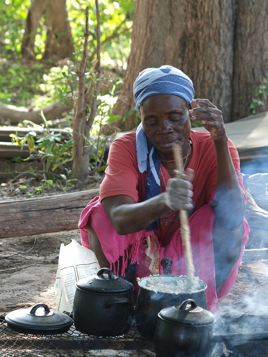 food, cook, botswana, africa, women, pan, poverty, sitting, senior adult, one person