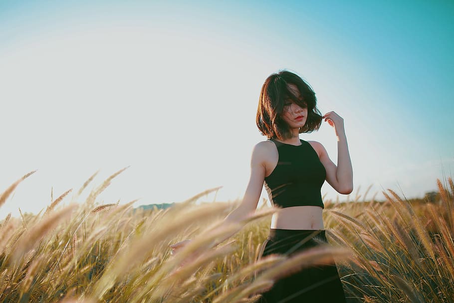 woman, black, crop-top, skirt, surrounded, grass, cropped, top, bottoms, field