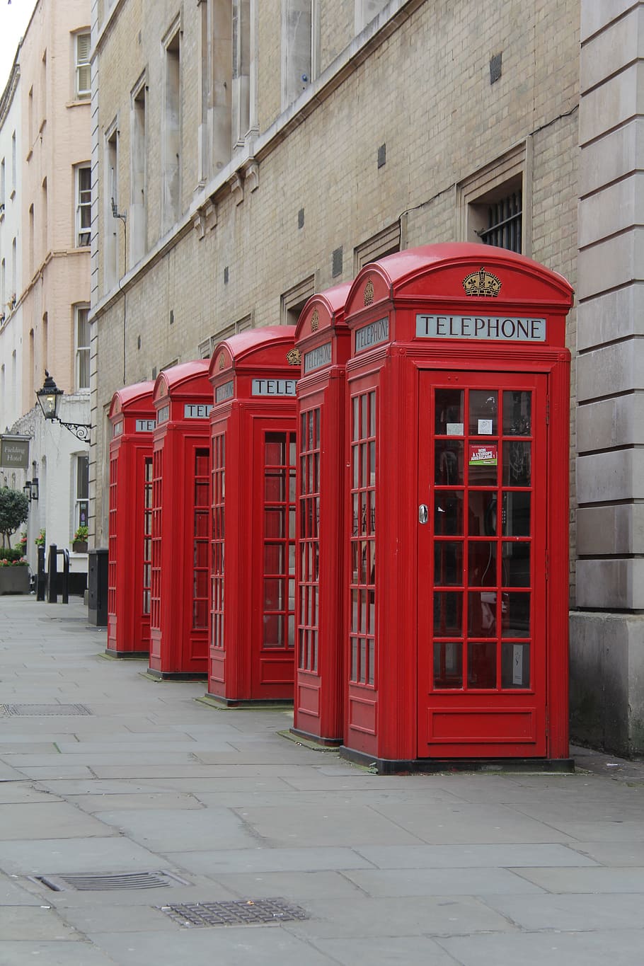 several telephone booths, red phone box, london, telephone, telephone box, united kingdom, england, building exterior, architecture, red