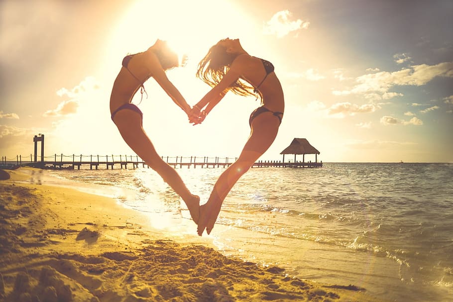 two, women, jumping, forming, heart shape, seashore, daytime, heart, two people, hands
