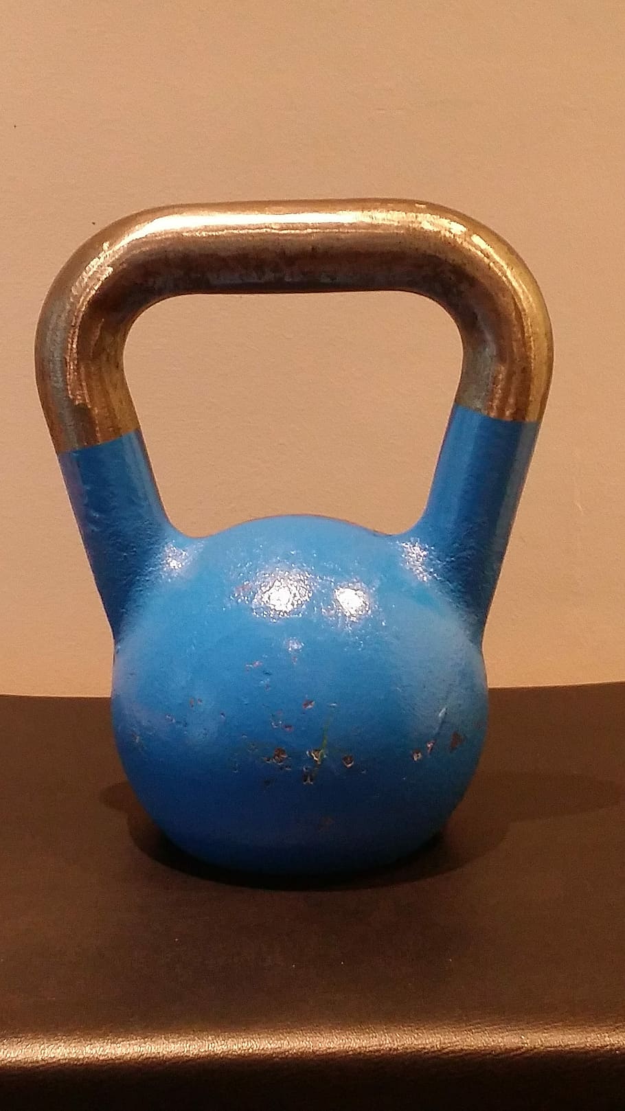 Kettlebell, blue, 12kg, studio shot, single object, colored background, indoors, still life, close-up, table