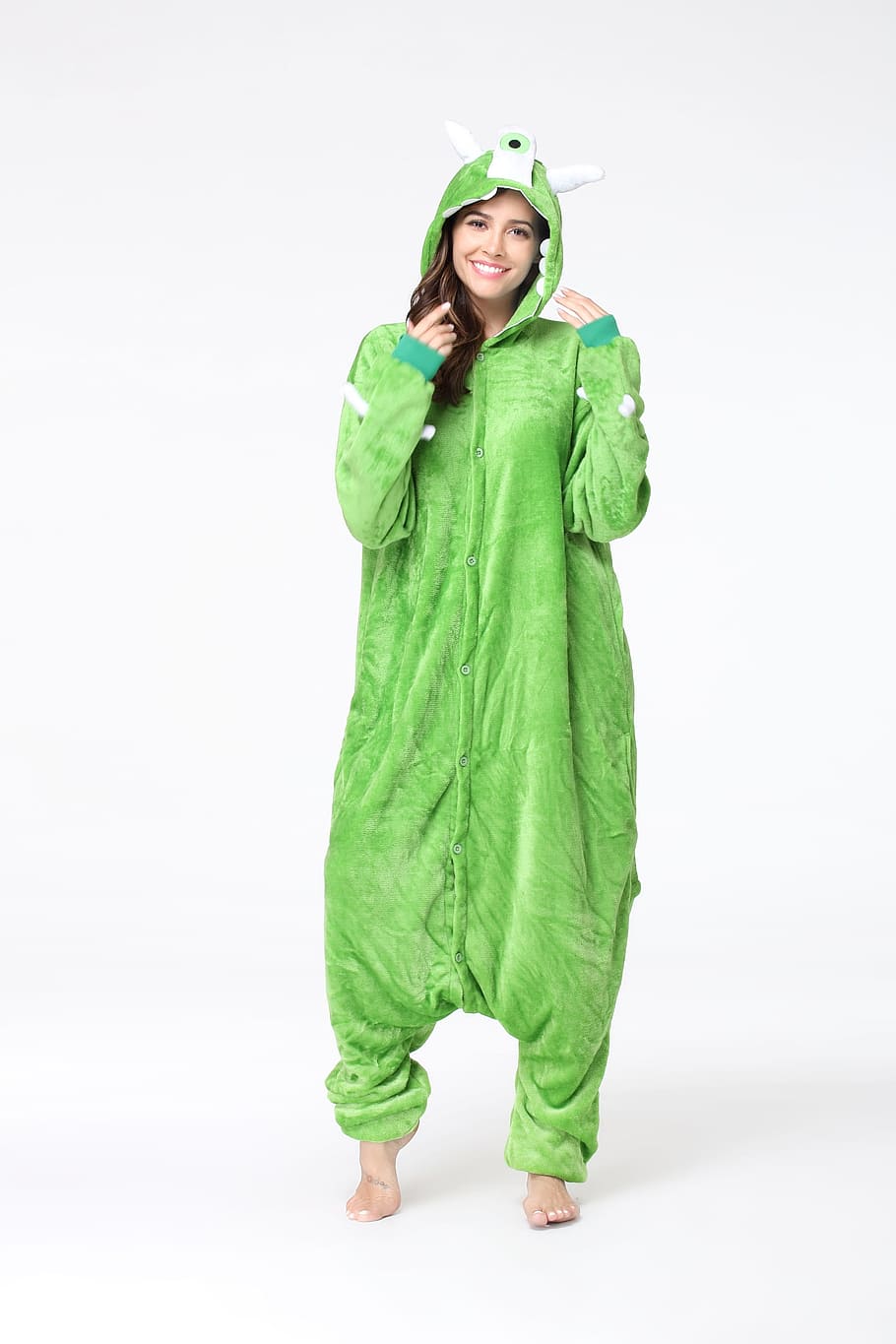 onesies, cartoon pajamas, animal costumes, green color, studio shot, one person, full length, looking at camera, portrait, clothing