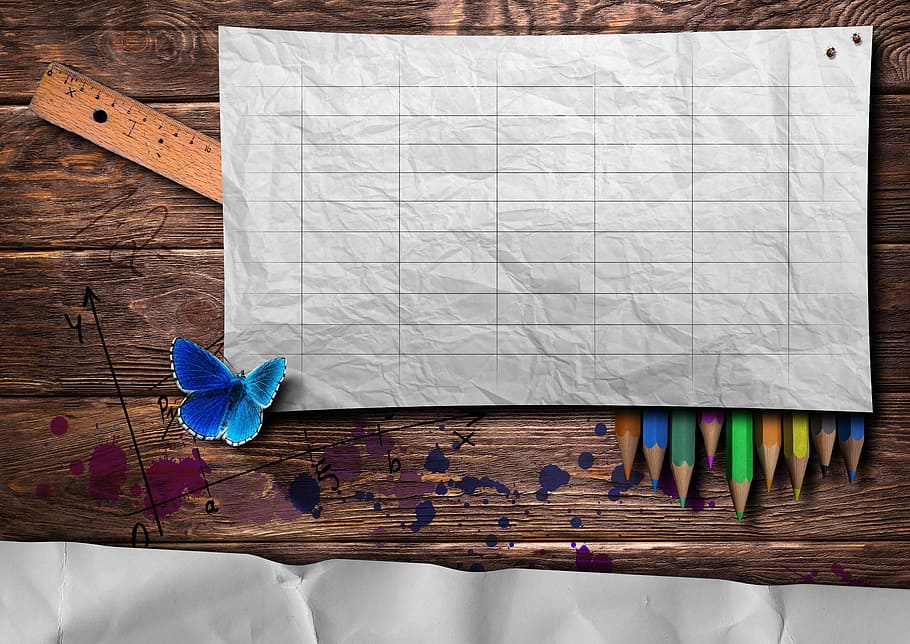 rectangular, white, case, colored, pencils, ruler, crumpled, paper, on top, colored pencils