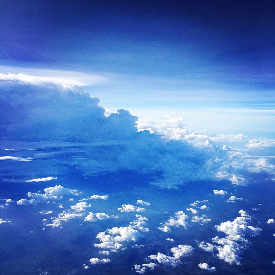 sky, the world as seen from an airplane, blue sky, cloud - sky, scenics - nature, beauty in nature, blue, tranquility, tranquil scene, nature