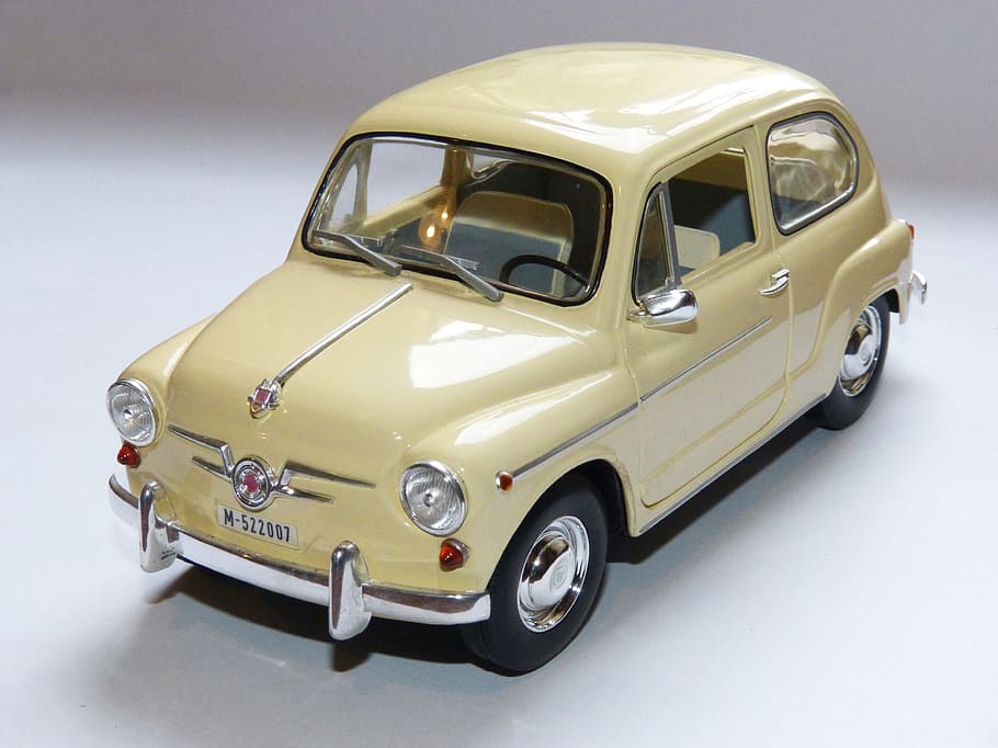 yellow, car die-cast model, toy, car, seat 600, miniature, motor vehicle, mode of transportation, transportation, land vehicle
