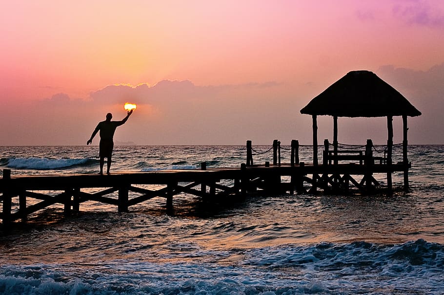 man, dock, golden, hour, sun, holding, ocean, peer, waves, silhouette