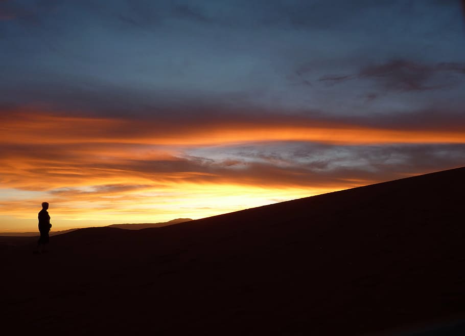 person, silhouette, sunset, atacama, moon, valley, argentine, flag, salt lake, landscape