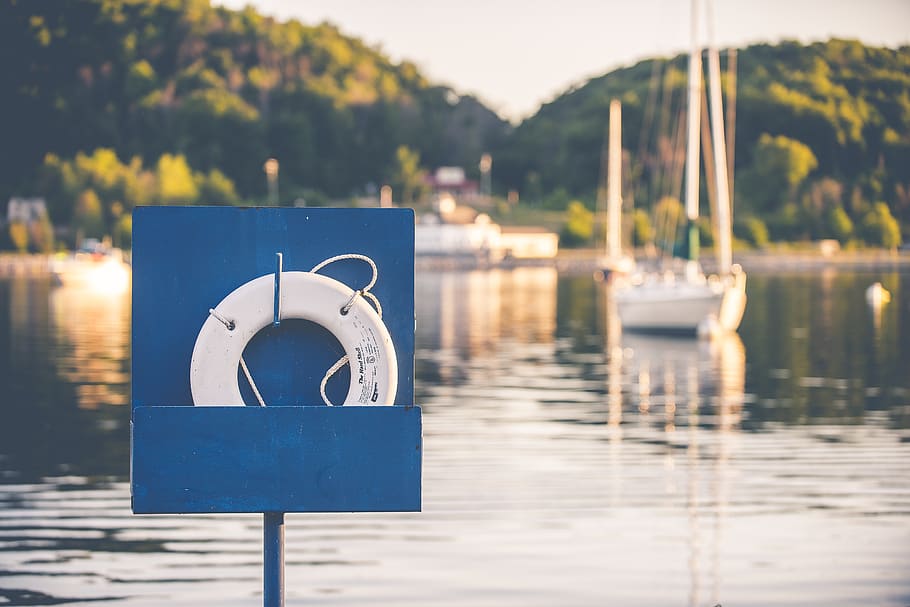 boat, inflatable ring, lake, lifebuoy, outdoors, pier, river, water, focus on foreground, day