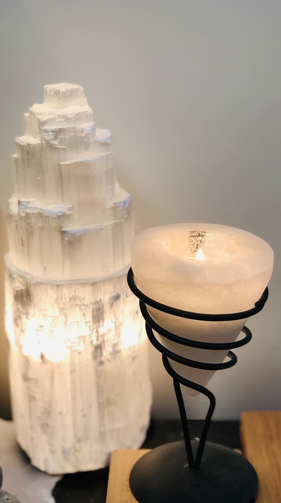 selenite lamps, selenite candle holder, selenite tower, indoors, table, lighting equipment, close-up, still life, glass - material, candle